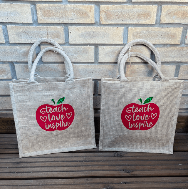 Teach love inspire jute tote bag